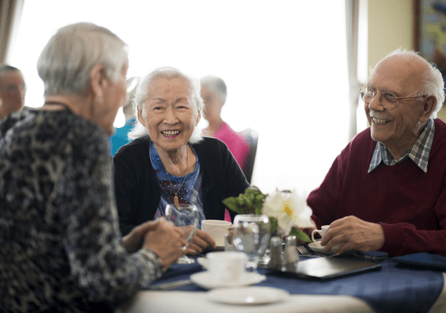 Group of seniors dining together